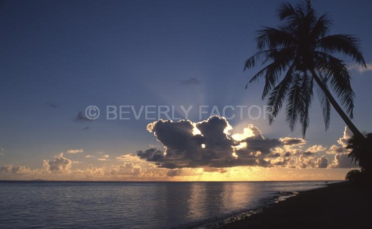 IslandSunset;sky;clouds;sun;water;red;palm trees;sillouettes;ocean;fiji;yellow;colorful;spiritual